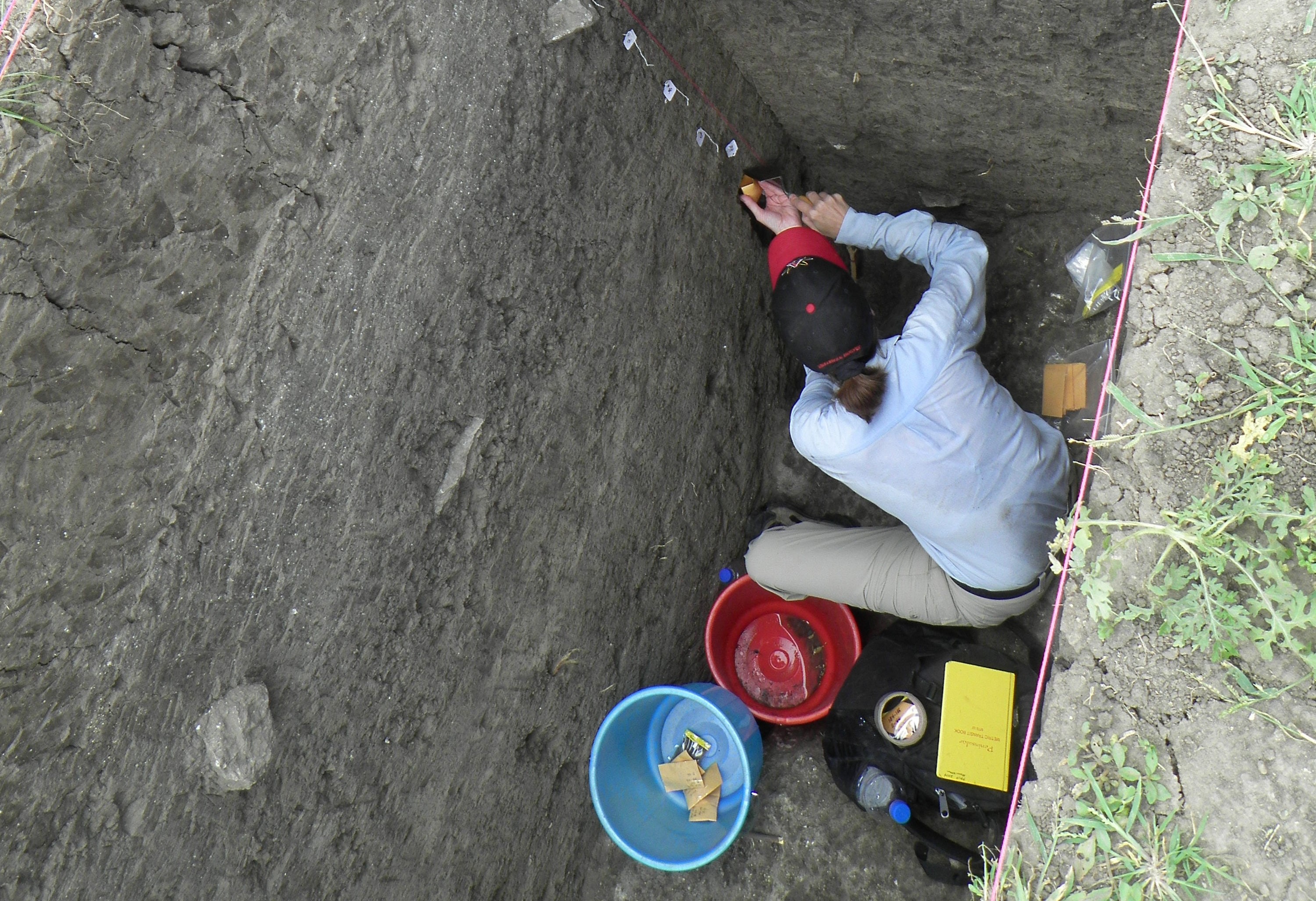 Kathy taking sediment samples for paleoenvironmental analysis