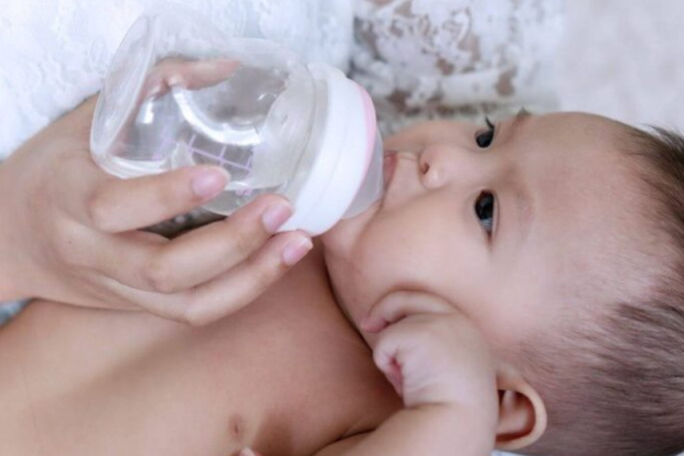 Baby with bottle