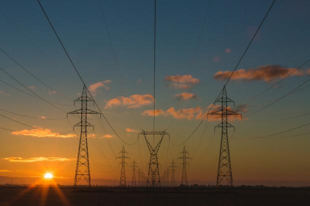 Power lines with a sunset