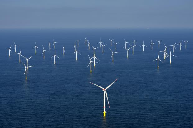 Cluster of windmills in an open sea.