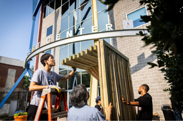 Students building a cooling shelter in Hunting Park to addressing the urban heat island effect.