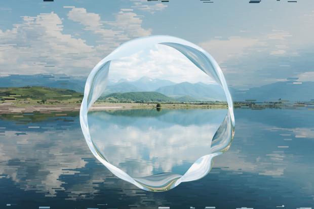 A large body of water with a large drop of water superimposed over it.