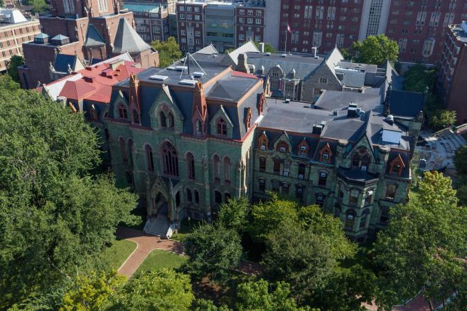 Aerial image of Penn nestled within the trees