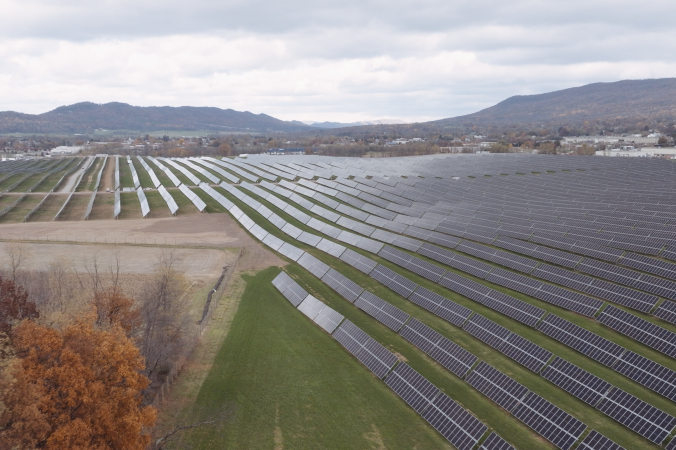 solar field stretching across agricultural area