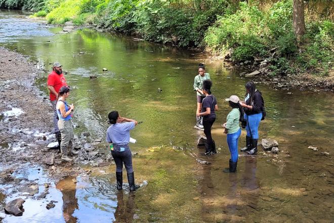 Jazmin Ricks and high school students from Paul Robeson High School at Cobbs Creek. 